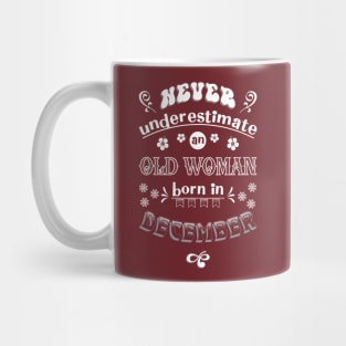 Never Underestimate an Old Woman Born in December Mug